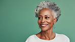 Radiant mature senior model woman with grey hair laughing and smiling for spa and dental