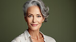 Radiant mature senior model woman with grey hair laughing and smiling for spa and dental