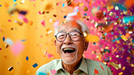 Happy laughing man with falling confetti. Birthday, New Year, fun celebration party