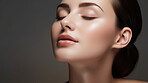 Closeup beauty portrait of a calm and peaceful woman for spa beauty, skincare in studio