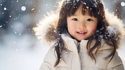 Buy stock photo Portrait of an Asian toddler girl enjoying the winter snow during the Christmas season