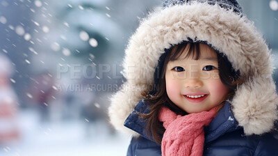 Buy stock photo Portrait of an Asian toddler girl enjoying the winter snow during the Christmas season