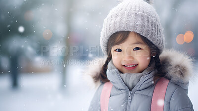 Buy stock photo Portrait of an Asian toddler girl enjoying the winter snow during the Christmas season