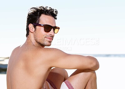 Buy stock photo Tattoo on body, young man at beach and with sunglasses sitting. Summer vacation or holiday break, freedom or traveling and happy male person relaxing at the seashore with glasses in sunshine