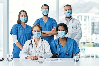 Buy stock photo Portrait of a group of medical practitioners having a meeting in a hospital boardroom
