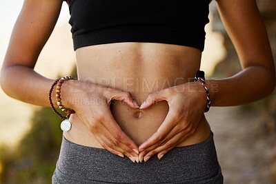 Buy stock photo Woman, stomach and hand with heart in outdoor for exercise, diet, fitness and closeup. Female tummy, gut health and self love for wellness and training in the summer for healthy workout outside.