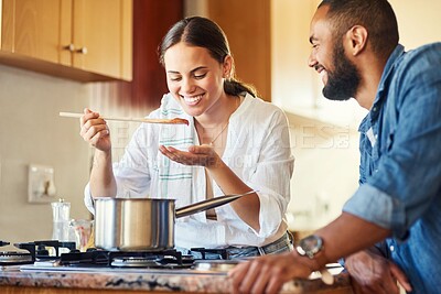 Buy stock photo Shot of a couple cooking together at home
