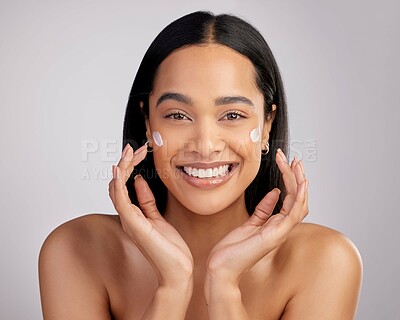 Buy stock photo Happy woman, portrait smile and cream for skincare, beauty or cosmetics against a grey studio background. Face of female person smiling for lotion, creme or cosmetic moisturizer or facial treatment