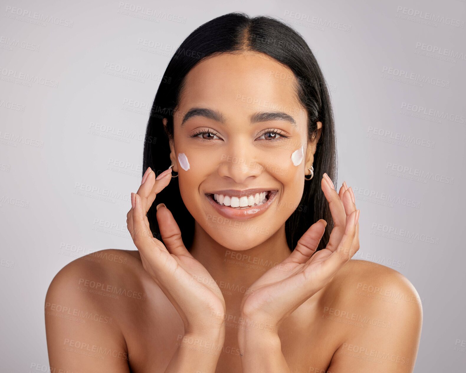 Buy stock photo Happy woman, portrait smile and cream for skincare, beauty or cosmetics against a grey studio background. Face of female person smiling for lotion, creme or cosmetic moisturizer or facial treatment