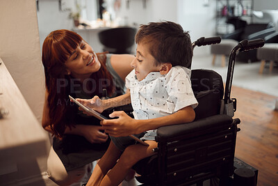 Buy stock photo Woman, child with a disability and tablet in wheelchair friendly salon for and inclusivity, special needs and hairdressing support. Kid with cerebral palsy, screen time and games in hairdresser shop.