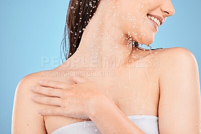 Buy stock photo Water splash, shower and woman cleaning body, skincare and hygiene while washing in blue studio background. Water drops or cosmetics for self care, skin model or healthy skin, clean and fresh beauty