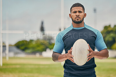 Buy stock photo Rugby, field and portrait of man with ball, serious expression and confidence in winning game. Fitness, sports and player training for match, workout or competition on grass at stadium with mockup.