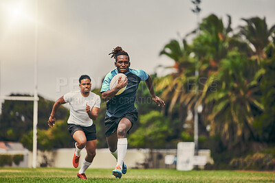 Buy stock photo Rugby, chase and black man with ball running to score goal on field at game, match or practice workout. Sports, fitness and motion, player in action and blur on grass with energy and skill in sport.