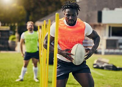 Buy stock photo Rugby, sports and black man training with equipment ready for match, practice and sport game. Fitness, performance and serious male athlete with ball for warm up, exercise and workout for competition