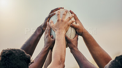 Buy stock photo Diversity, team and hands together in sports on rugby ball for support, motivation or goals outdoors. Hand of sport group unity in fitness, teamwork or success for match preparation or game