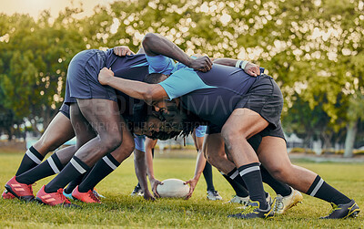 Buy stock photo Scrum, sports and men playing rugby, catching a ball and preparing for a game on the field. Ready, together and competitive players scrumming for the start of a sport competition with contact