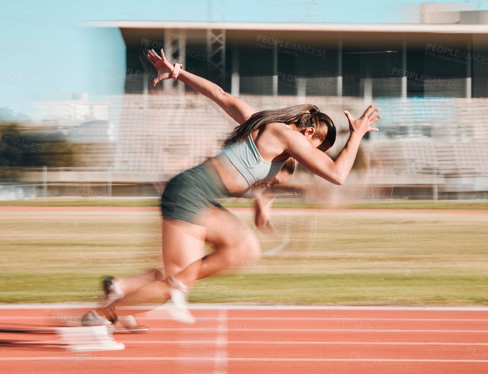 Buy stock photo Action, race and women athlete running a sprint in competition or fitness game training as energy wellness on track. Sports, stadium and athletic person or runner exercise, speed and workout