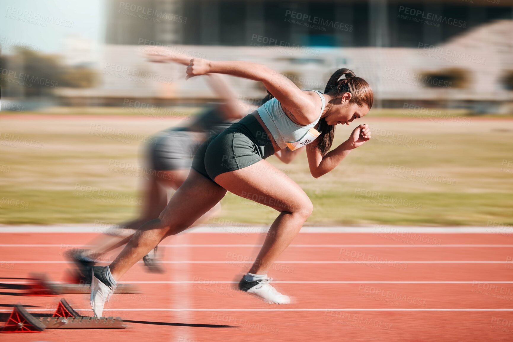 Buy stock photo Action, speed and women athlete running sprint in competition for fitness game and training for energy wellness on a track. Sports, stadium and athletic people or runner exercise, speed and workout