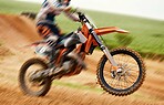 Bike, balance and motion blur with a sports man on space outdoor for dirt biking closeup. Motorcycle, fitness and performance with a person driving fast on an off road course for freedom or challenge