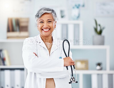 Buy stock photo Doctor, senior woman and stethoscope, arms crossed for healthcare in hospital and professional cardiovascular surgeon. Portrait, health and medical tools with confidence, medicine and cardiology