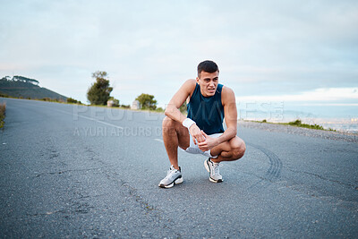 Buy stock photo Sports, nature and man athlete breathing on break of race, marathon or competition training and workout. Fitness, fatigue and tired young male runner resting for outdoor cardio exercise for endurance