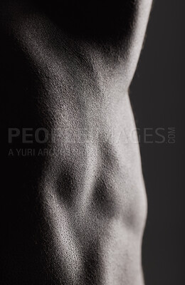 Buy stock photo Fitness, man and torso with closeup in studio for wellness, stomach and body on dark background. Person, muscle or bodybuilder with six pack for healthy lifestyle and strength for abdomen or topless
