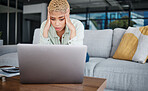 Businesswoman, stressed and laptop with work in office with report, financial planning or proposal for budget. African, person and frustrated with documents for meeting in sales, marketing and costs
