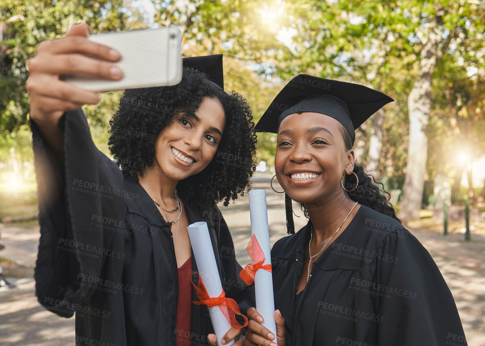 Buy stock photo Graduation diploma, women and happy friends selfie for learning success, university education or memory photo. College progress, park photography or students post school profile picture on campus app