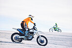 Motorcycle, desert and moto sport fitness with men outdoor on hill with race, journey and adventure. Extreme, sand and motorbike challenge of biker people with driving exercise and training in Dubai