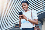 Cellphone, walking and young woman in the city networking on social media, mobile app or the internet. Happy, technology and African female person scroll on a phone and commuting in urban town street