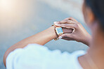 Closeup, woman and arm with watch for time management with elegance for business meeting in city. African, person or lawyer for immigration, litigation or family law while wait for commute to client