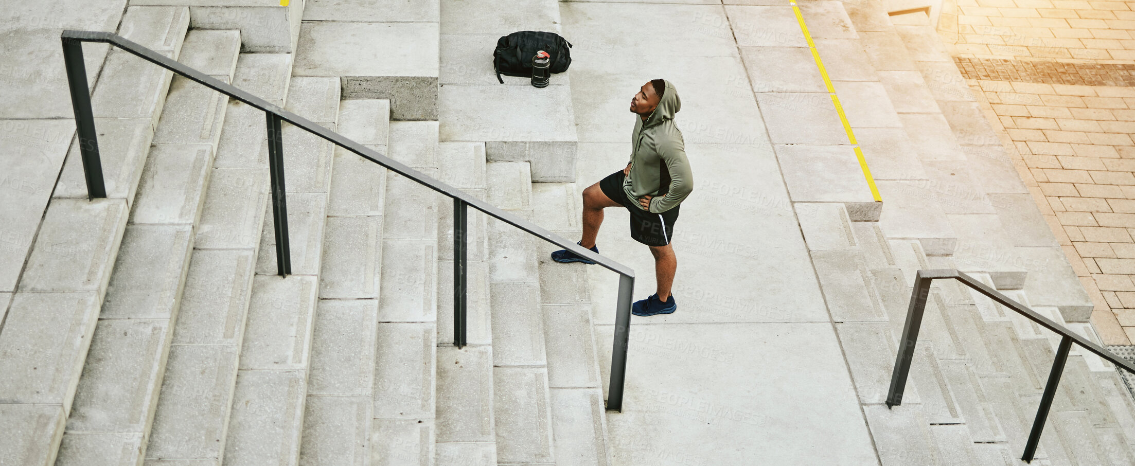 Buy stock photo Tired black man, stairs and fitness on break from running, exercise or outdoor workout in city. Banner of African male person, athlete or runner in rest, recovery or training on steps in urban town