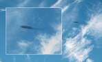 Ufo, spacecraft in sky and alien on camera screen outdoor, science fiction fantasy or conspiracy theory. Evidence of extraterrestrial spaceship blur, surreal saucer fly in clouds and camcorder record