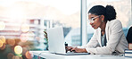 Businesswoman, laptop and typing a proposal in corporate office, agenda and report or schedule. Black ceo, research and review or email via internet, digital and technology with bokeh in mockup