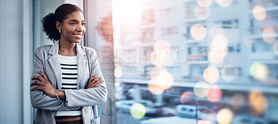 Buy stock photo Black woman, office and arms crossed with confidence, leadership and city buildings in bokeh. Smiling, work and career as professional, corporate and hr specialist in company, happy and workplace
