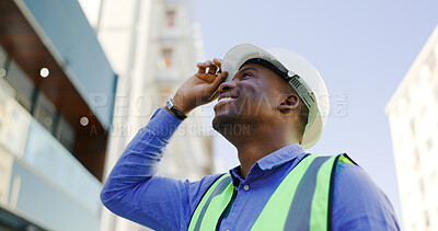 Buy stock photo Happy black man, architect and city with helmet for construction, architecture or building on site. African male person, engineer or engineer smile with hard hat for industrial safety in urban town