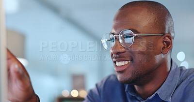 Buy stock photo Smile, research and professional businessman in the office planning legal project with deadline. Reading, glasses and young African male attorney working on a corporate law case in workplace at night