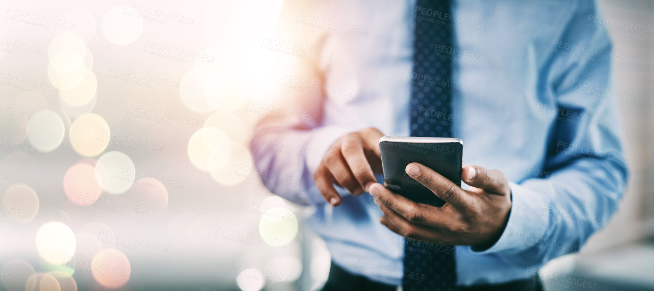 Buy stock photo Businessman, phone and hands typing for networking or communication on bokeh background at office. Closeup of man on mobile smartphone app for online texting, chatting or social media and research