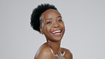 Face, skincare and beauty of funny black woman in studio isolated on a gray background mockup space. Portrait, natural cosmetics and African model laugh in spa facial treatment, wellness and health