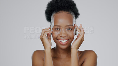 Buy stock photo Face, skincare and hands of happy black woman in studio isolated on gray background for dermatology. Portrait, touch and natural beauty cosmetics of model in spa facial treatment, wellness or health