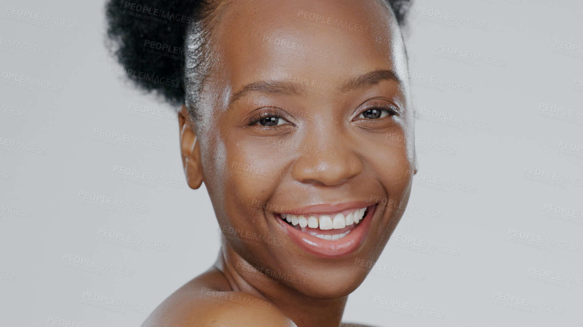 Buy stock photo Portrait, skincare and smile with a happy black woman in studio on a gray background for natural wellness. Face, beauty and aesthetic with a happy young model closeup for antiaging skin treatment