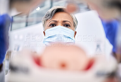 Buy stock photo Medical, surgery and blur of doctor in emergency in a operation room or hospital for medicine and with face mask. Healthcare, theatre and professional surgeon doing treatment or exam on injury