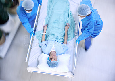 Buy stock photo Doctors, team and hurry with bed in hospital for medical emergency, surgery operation or helping from above. Healthcare group running fast in rush, motion blur and urgent patient assessment in clinic