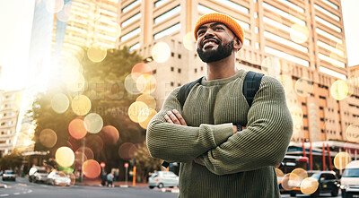 Buy stock photo Happy, man and student with arms crossed in city to travel or commute to university in urban, cbd or town campus. College, person and confident outdoor with smile or relax in street with buildings