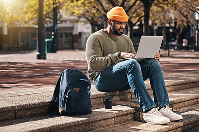 Buy stock photo Student, laptop and outdoor campus for university, college or scholarship research, studying or information on stairs. African man typing on computer for online education, website and e learning FAQ