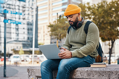 Buy stock photo Student, man and computer in city for college application, university research or scholarship website information. Happy african person on laptop, typing and studying philosophy or language on campus