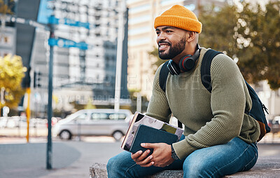 Buy stock photo Happy man sitting in city with university books and smile on morning relax at campus for education with backpack. Learning, studying and college student waiting on urban street with school notebook.