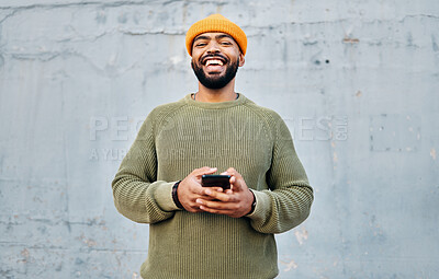 Buy stock photo Phone, happy and portrait of man by wall networking on social media, mobile app or the internet. Technology, smile and person from Colombia scroll on website with cellphone in city by gray background