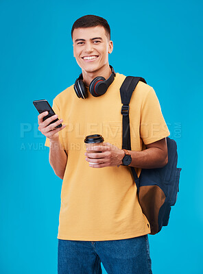Buy stock photo Student, man and smile with phone, studio and portrait with coffee by blue background. Asian male, ready and portrait for university, scholarship and education, smartphone and online registration