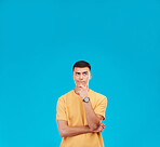 Thinking, mockup and young man in studio with decision, brainstorming or solution expression. Problem solving, idea and male model from Canada with reflection, memory or question by blue background.